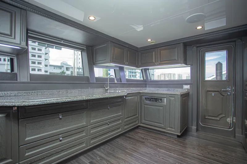 Slide: The Image of Luxurious kitchen interior of 2014 Fifth Ocean Yachts 24m Explorer Yacht with sleek cabinetry. - 31