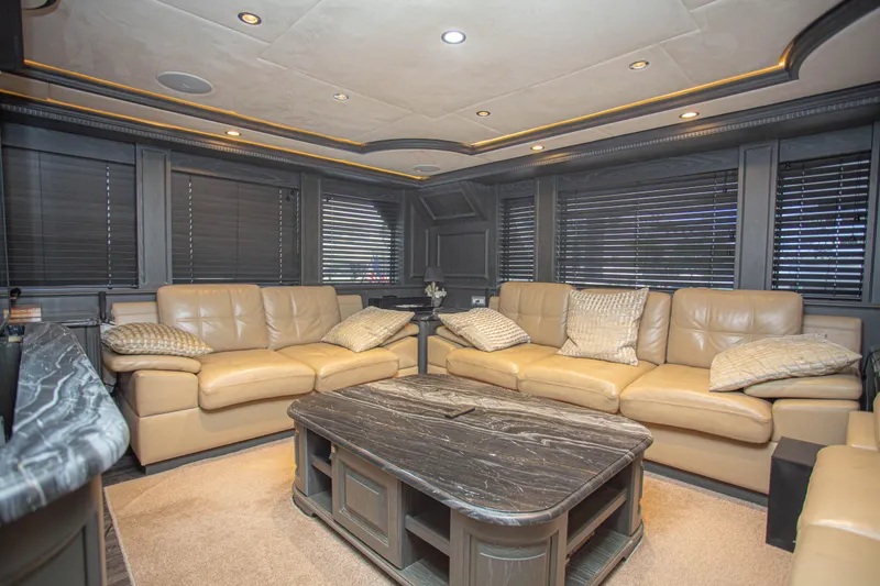 Slide: The Image of Luxurious interior of 2014 Fifth Ocean Yachts 24m Explorer, featuring plush leather seating and elegant decor. - 40