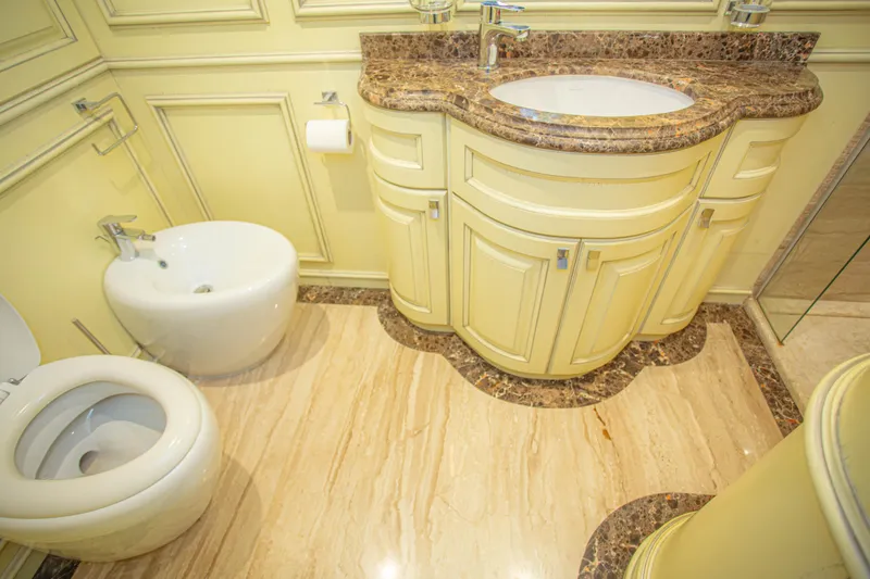 Slide: The Image of Luxurious yacht bathroom with marble countertop and elegant fixtures, Fifth Ocean Yachts 2014 model. - 49
