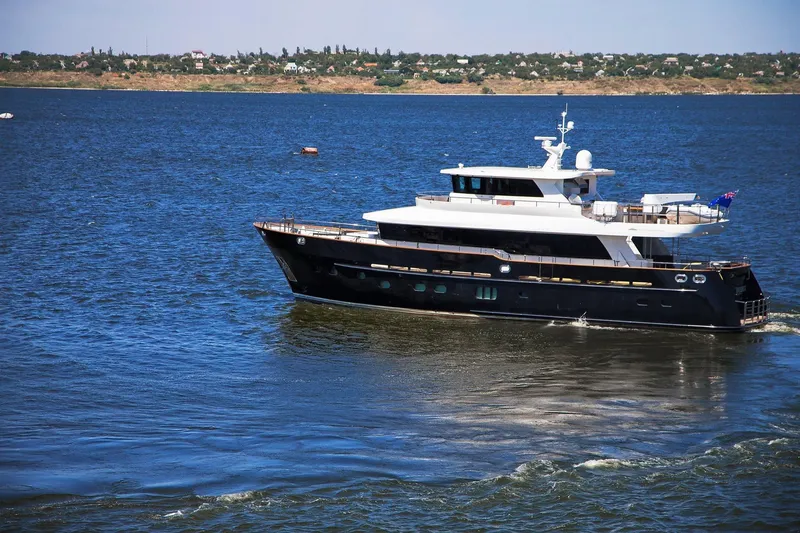 Slide: The Image of Fifth Ocean Yachts 24m Displacement Explorer Yacht, 2014, cruising on a serene blue sea. - 95