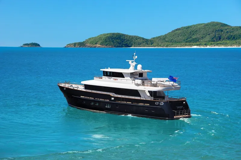 Slide: The Image of 2014 Fifth Ocean Yachts 24m Displacement Explorer Yacht cruising in blue waters. - 92