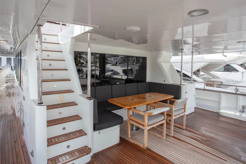 Slide: The Image of Luxurious 2014 Fifth Ocean Yachts 24m Explorer Yacht deck with seating and staircase. - 8