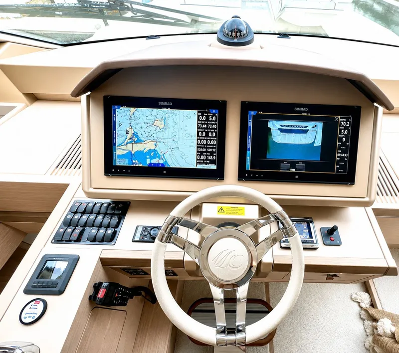 Slide: The Image of 2019 Monte Carlo MC6 cockpit with navigation system. - 48