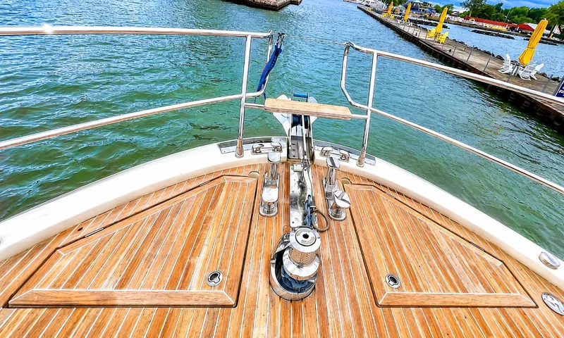 Slide: The Image of Bow view of Monte Carlo MC6 yacht on the water. - 9
