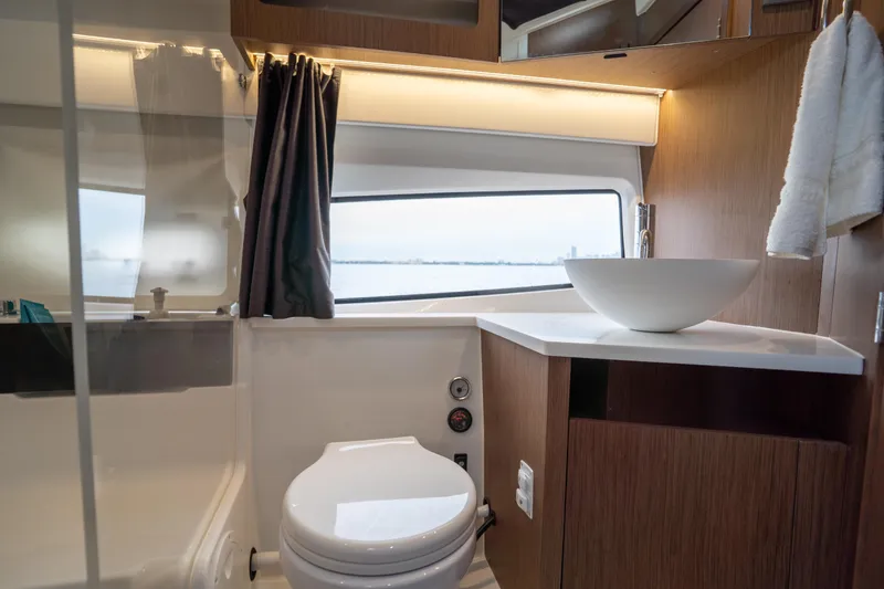 Slide: The Image of Modern bathroom interior of 2023 Beneteau Antares 11 yacht with sleek fixtures and ocean view. - 29