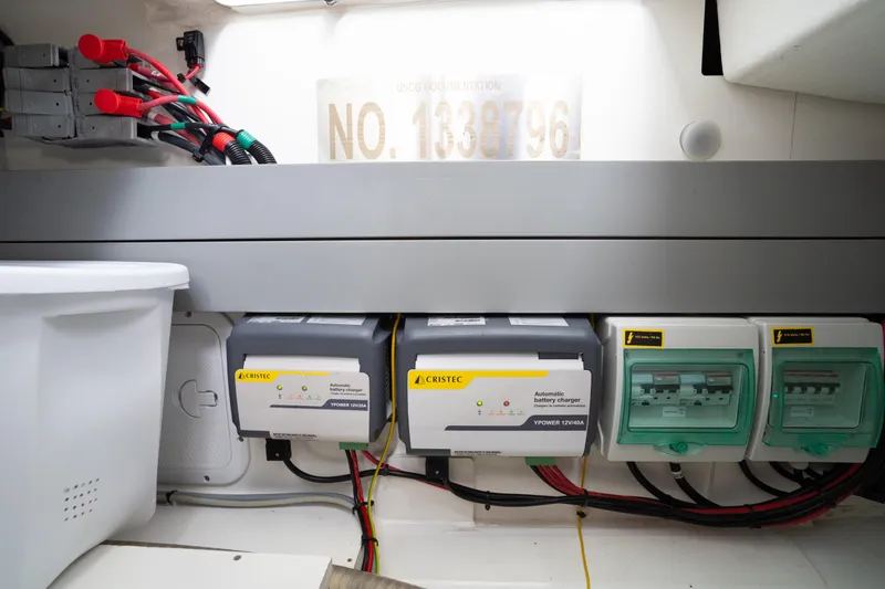 Slide: The Image of Electrical system of 2023 Beneteau Antares 11 boat, featuring battery chargers and wiring. - 44