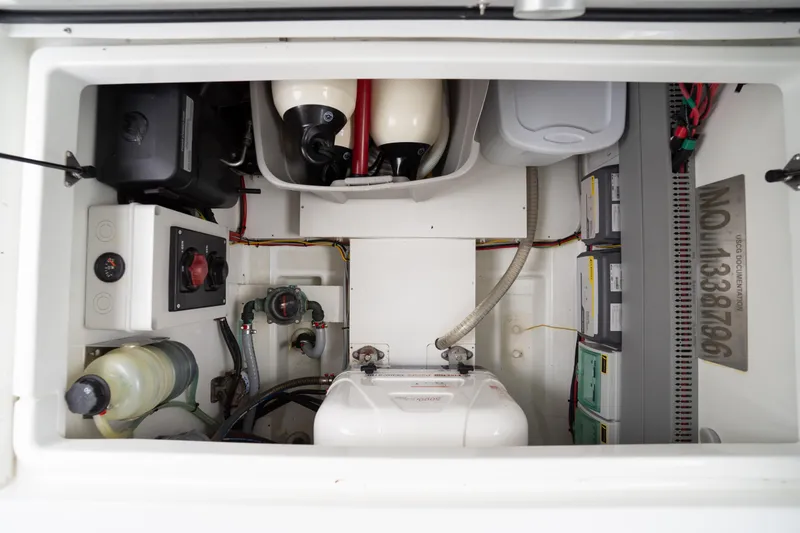 Slide: The Image of Engine compartment of 2023 Beneteau Antares 11, showcasing wiring and mechanical components. - 45