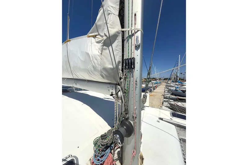 Slide: The Image of 2004 Outremer Standard sailboat mast and rigging at marina dock. - 7