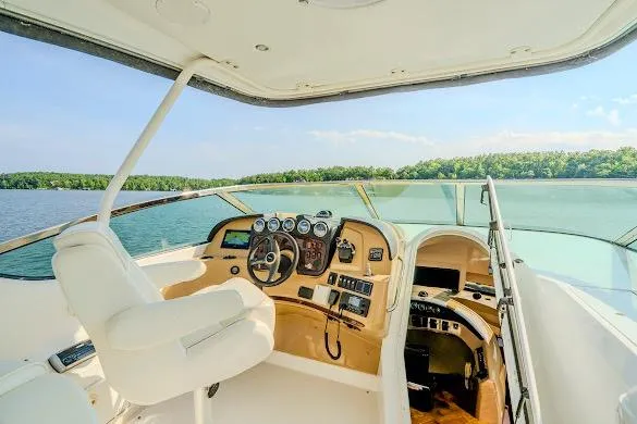 Slide: The Image of Pilothouse of 2003 Carver 570 Voyager yacht with scenic water view. - 34