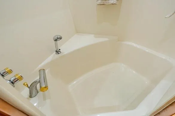 Slide: The Image of Luxurious bathtub in 2003 Carver 570 Voyager Pilothouse yacht bathroom. - 61