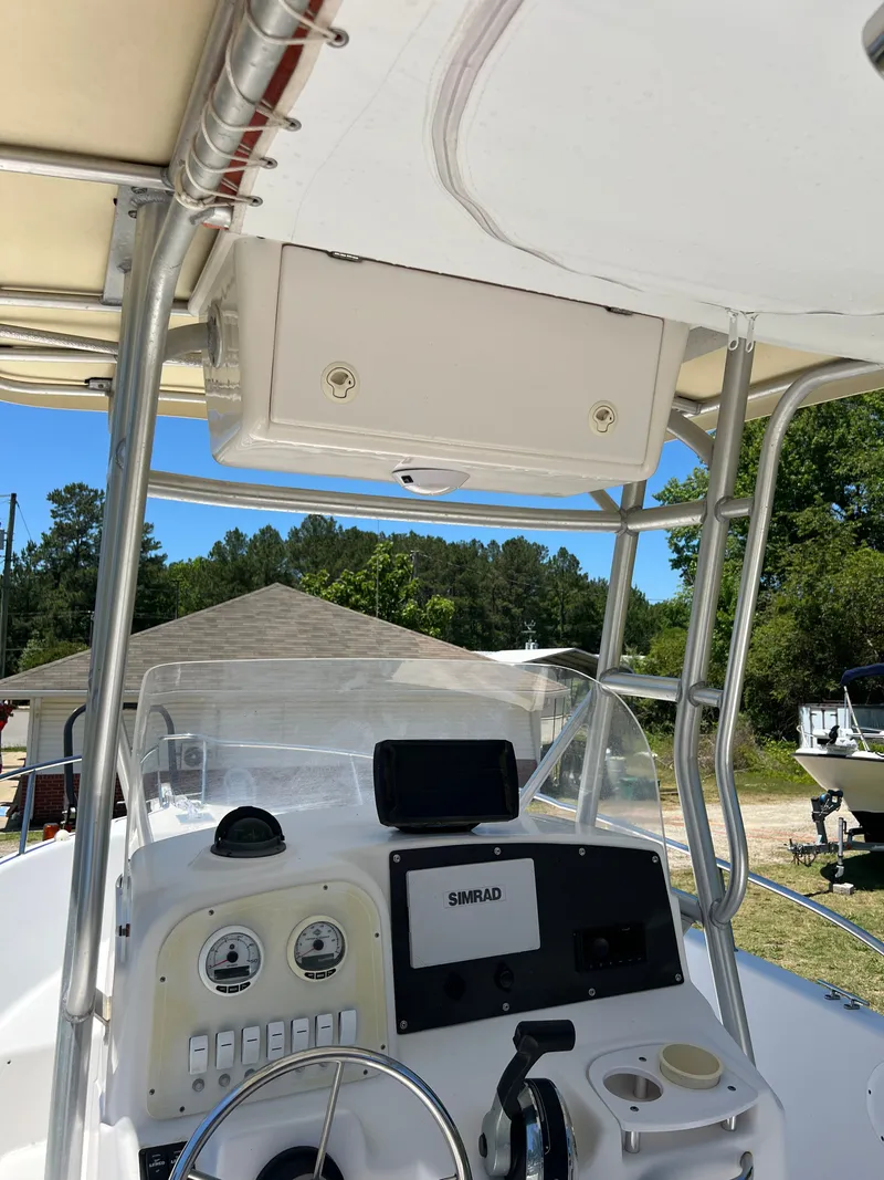 Slide: The Image of 2004 Pro-Line 20 Sport boat console with Simrad display. - 14