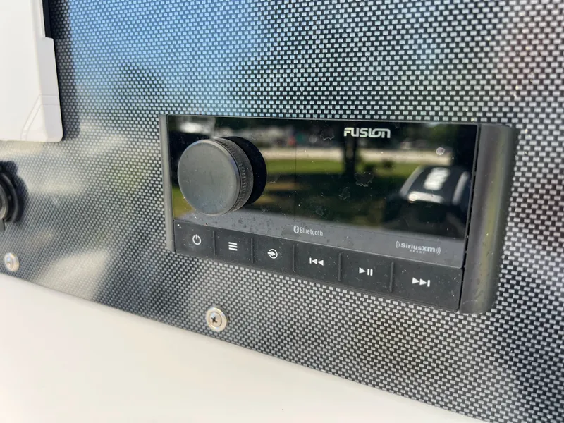 Slide: The Image of Fusion Bluetooth stereo system on 2004 Pro-Line 20 Sport boat. - 16