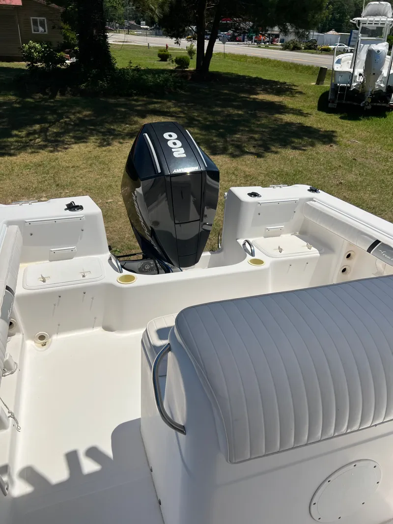 Slide: The Image of Interior view of a 2004 Pro-Line 20 Sport boat with outboard motor. - 3