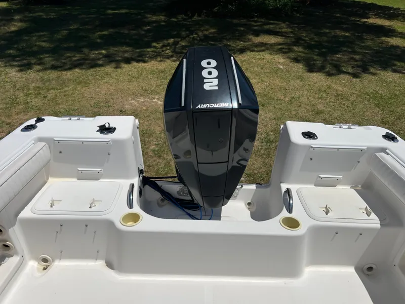 Slide: The Image of 2004 Pro-Line 20 Sport boat with Mercury outboard motor. - 4