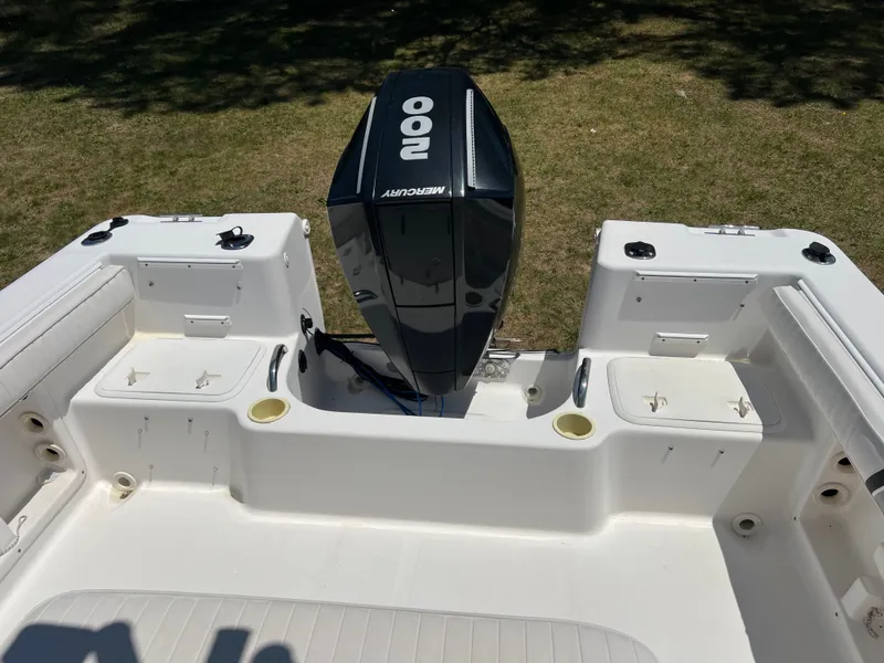 Slide: The Image of 2004 Pro-Line 20 Sport boat with Mercury outboard motor. - 5