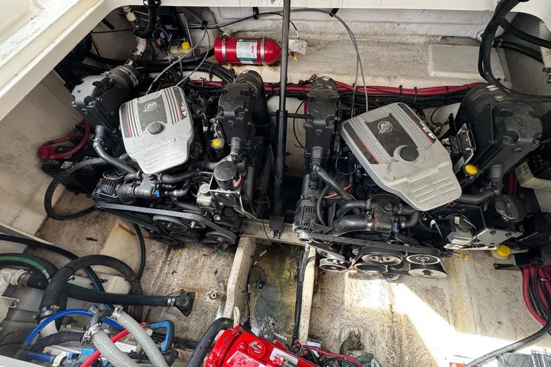 Slide: The Image of Engine compartment of a 2010 Sea Ray Sundancer 310 with dual inboard motors. - 4