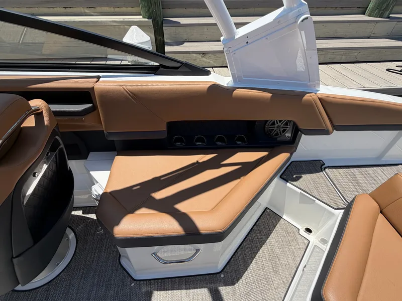 Slide: The Image of Interior of 2024 Cobalt R4 OB with brown leather seating. - 12