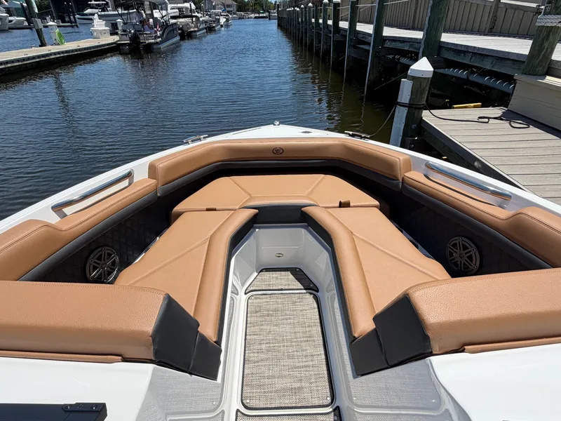 Slide: The Image of 2024 Cobalt R4 OB boat interior with tan seating. - 22