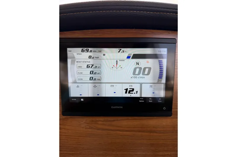 Slide: The Image of Garmin display on 2025 Cutwater C-248 Coupe showing boat status and navigation data. - 22