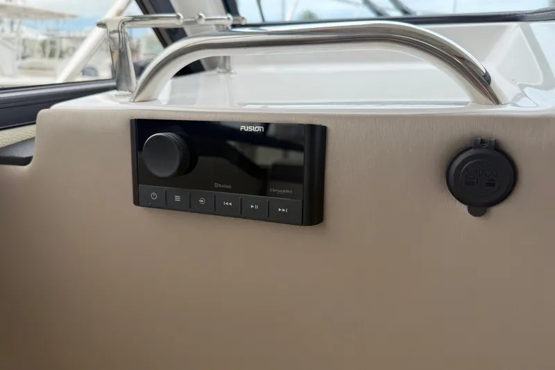 Slide: The Image of 2025 Cutwater C-248 Coupe interior with Fusion audio system and Sundog accessory port. - 24