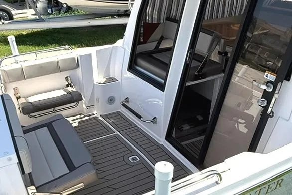Slide: The Image of 2025 Cutwater C-248 Coupe boat interior with seating and modern design. - 6