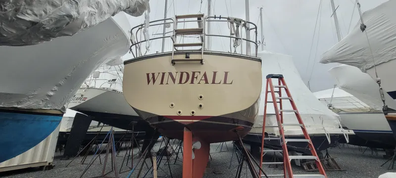 Slide: The Image of 1987 Island Packet 31 sailboat in dry dock. - 1