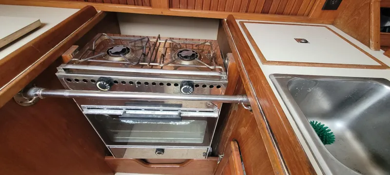 Slide: The Image of Galley area of a 1987 Island Packet 31 yacht. - 16