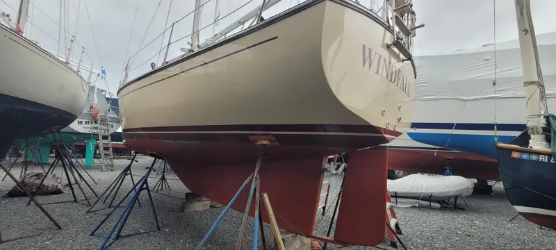 Slide: The Image of 1987 Island Packet 31 sailboat on a dry dock. - 2