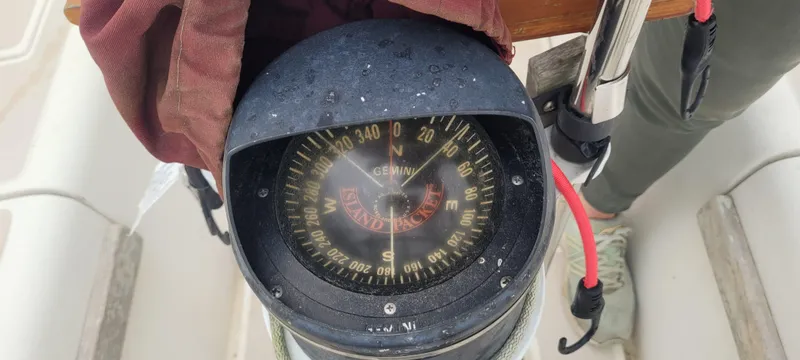 Slide: The Image of Compass on Island Packet 31 sailboat, year 1987. - 24