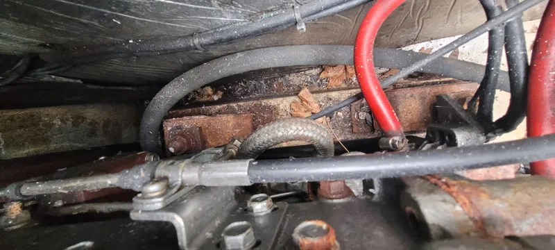 Slide: The Image of Engine compartment of a 1987 Island Packet 31 sailboat. - 32