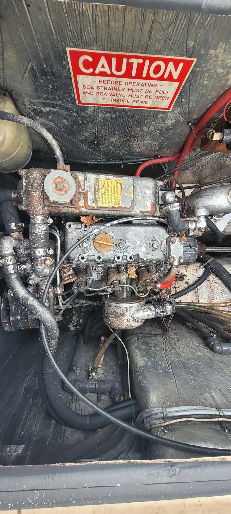 Slide: The Image of Engine compartment of a 1987 Island Packet 31 sailboat. - 35