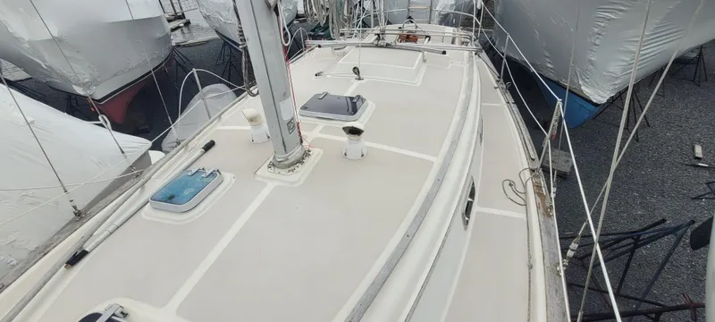 Slide: The Image of Deck of a 1987 Island Packet 31 sailboat in harbor. - 45