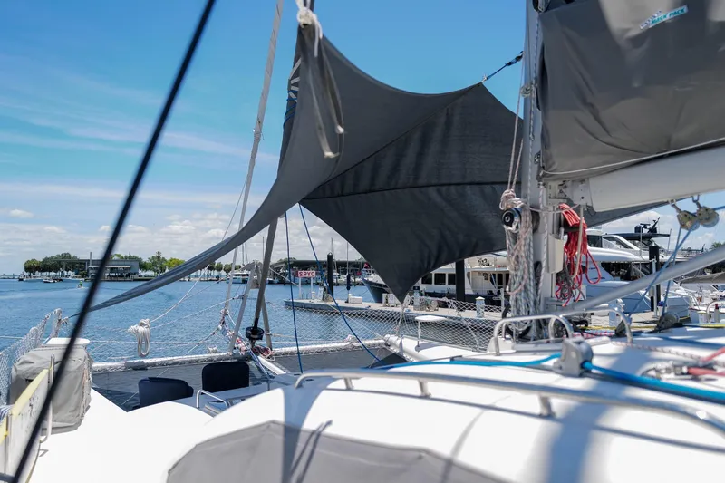 Slide: The Image of Sailboat Leopard 43, 2006 model, docked at marina with clear blue sky. - 20