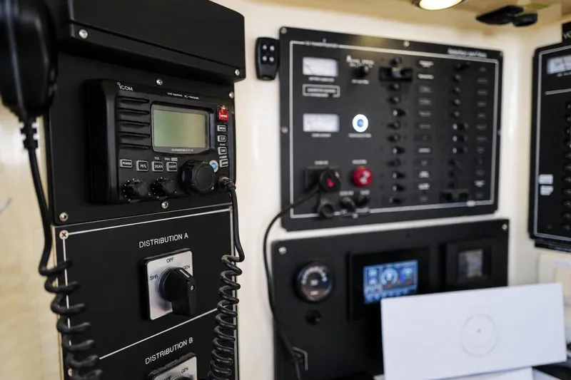 Slide: The Image of Control panel of a 2006 Leopard 43 yacht featuring communication and distribution systems. - 28