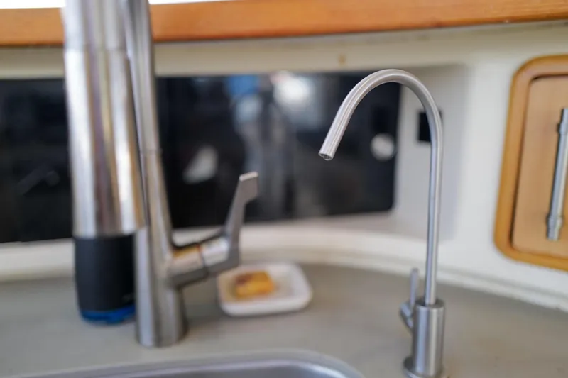 Slide: The Image of Stainless steel faucet in a 2006 Leopard 43 yacht kitchen. - 37