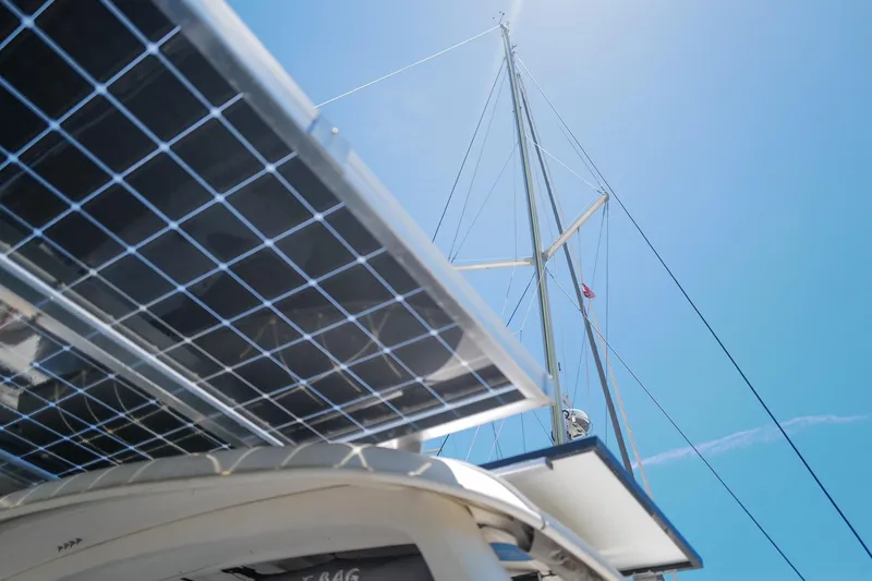 Slide: The Image of Solar panels on a 2006 Leopard 43 yacht with clear blue sky background. - 88