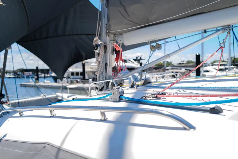Slide: The Image of Sailing yacht Leopard 43, 2006 model, docked at marina with visible rigging and deck details. - 96