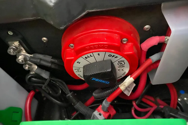 Slide: The Image of Red Perko battery switch in a 2018 Harris Solstice 240 boat. - 20
