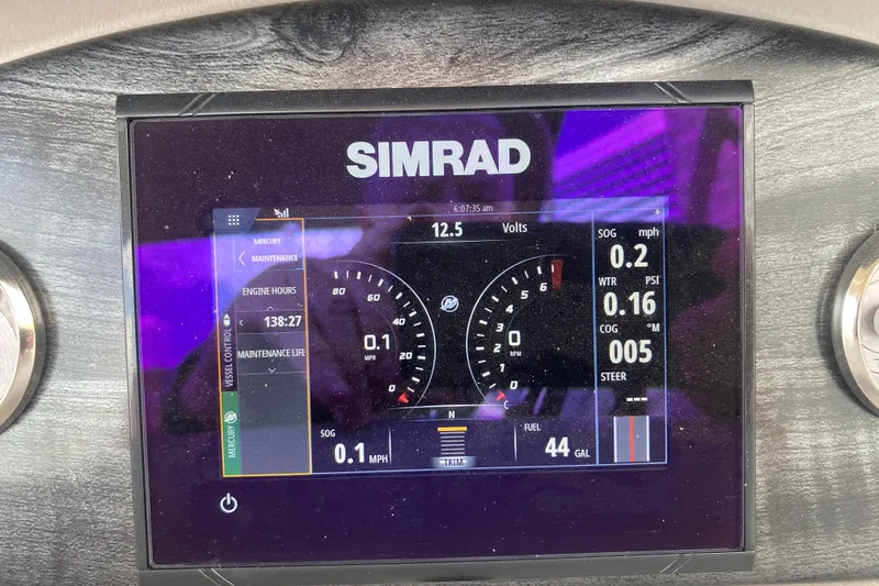 Slide: The Image of Simrad display on 2018 Harris Solstice 240 showing engine metrics and navigation data. - 17