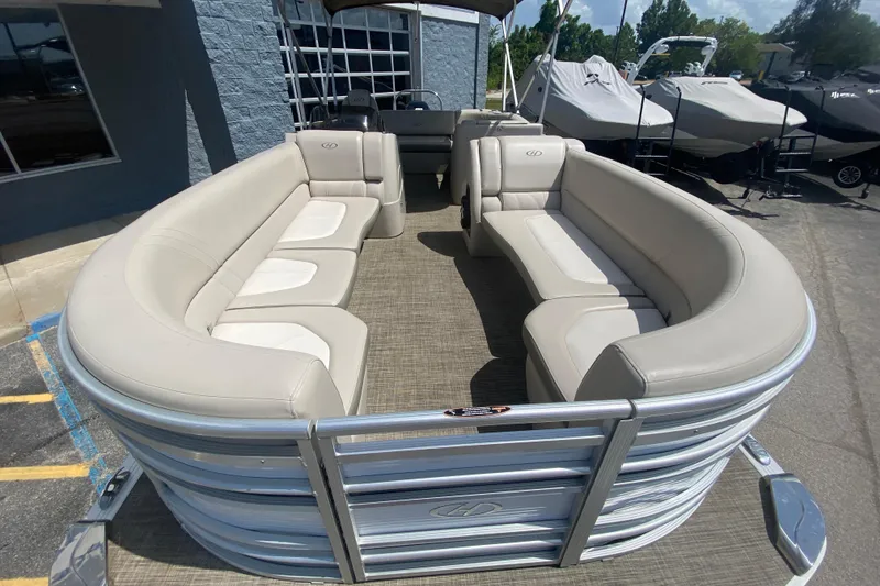 Slide: The Image of 2018 Harris Solstice 240 pontoon boat with spacious seating and sleek design. - 7