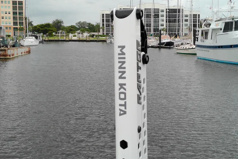 Slide: The Image of Minn Kota Raptor anchor on Sea Hunt Ultra 235 SE, marina background, 2026 model. - 21