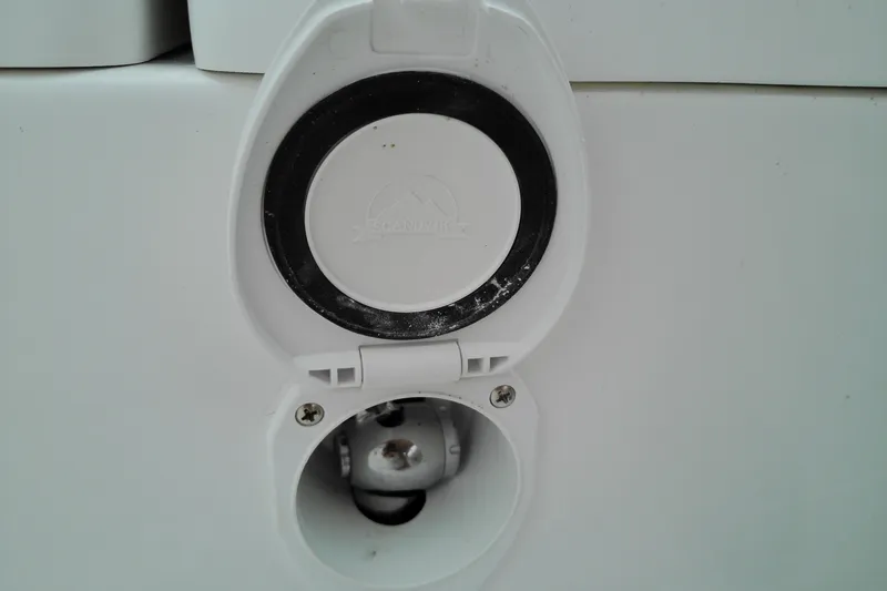 Slide: The Image of White circular hatch on 2026 Sea Hunt Ultra 235 SE boat. - 23