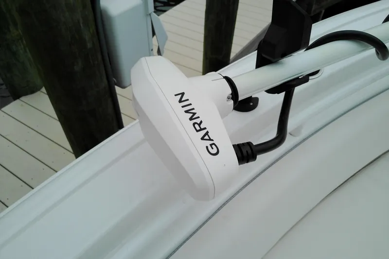 Slide: The Image of Garmin device mounted on 2026 Sea Hunt Ultra 235 SE boat. - 5