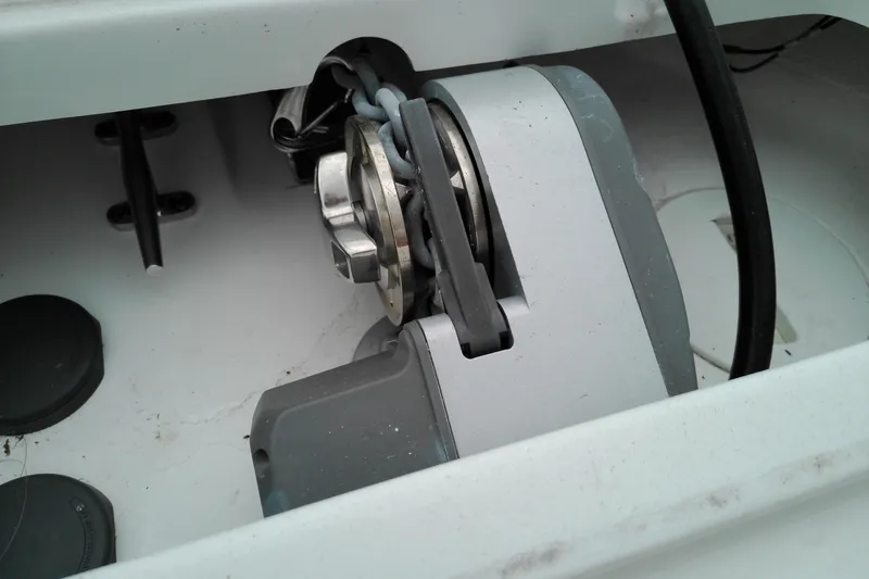 Slide: The Image of Anchor winch mechanism on 2026 Sea Hunt Ultra 235 SE boat. - 7