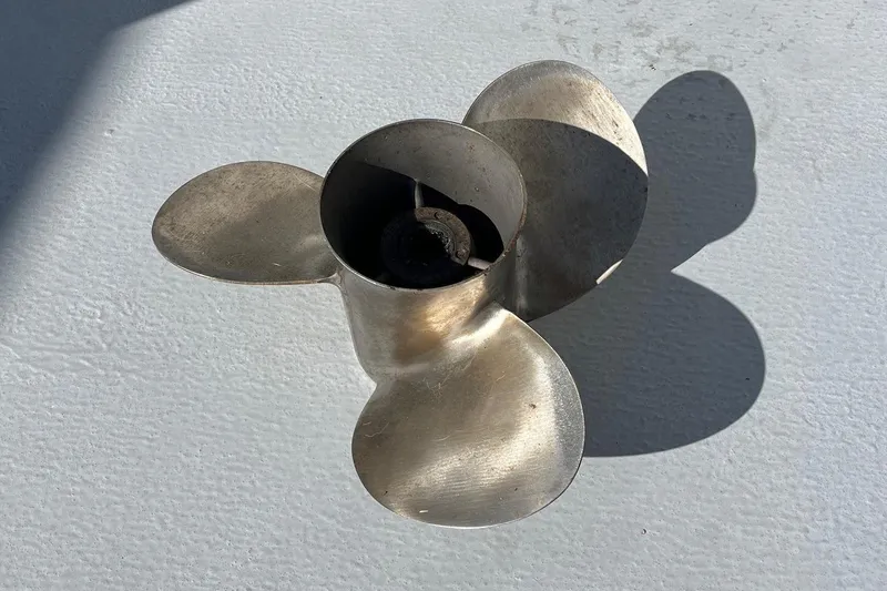 Slide: The Image of Stainless steel boat propeller for 2014 Seaway 24 Seafarer on white surface. - 13