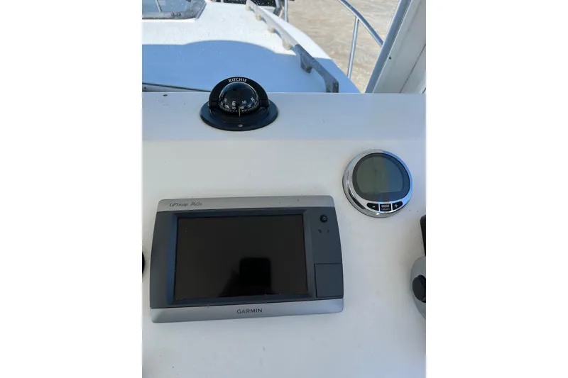Slide: The Image of Dashboard of 2014 Seaway 24 Seafarer with Garmin GPS and compass. - 8