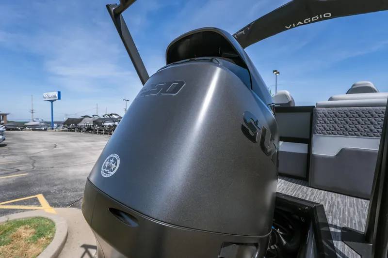 Slide: The Image of 2026 Viaggio Z24U boat with powerful outboard motor in a dealership lot. - 3