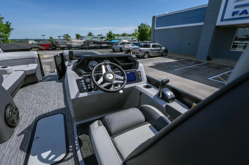 Slide: The Image of Interior view of 2026 Viaggio Z24U boat cockpit with steering wheel and controls. - 9