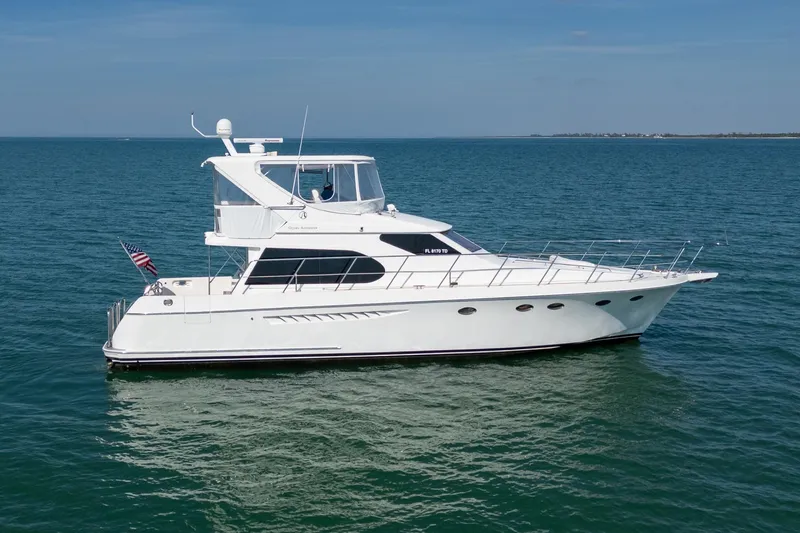 Slide: The Image of 2007 Ocean Alexander 52 Sedan yacht cruising on open water. - 6