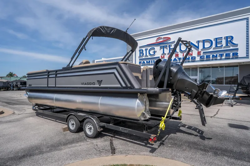 Slide: The Image of 2026 Viaggio Z24U pontoon boat on trailer at Big Thunder Marine center. - 24